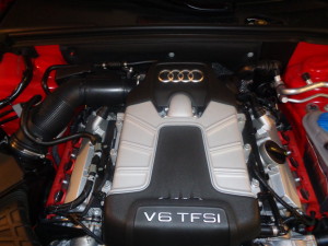Underhood, once for V-8, now houses supercharged V-6
