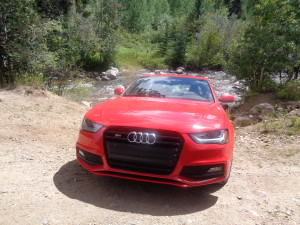 The large grille identifies an Audi.