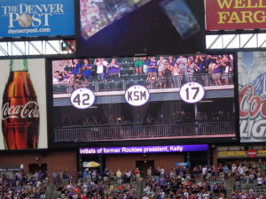 A Coors Field view of Todd Helton’s retired No. 17, beside those for the late Jackie Robinson and Keli McGregor. (Jan Wells photo) 