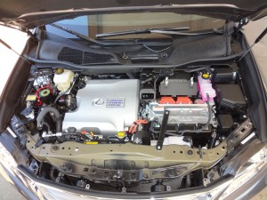 The Lexus gas/electric hybrid drive setup beneath the hood of 2015 RX450h.