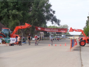 Bike riders at finish of Pedal the Plains in Wiggins.