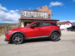 The 2016 Mazda CX-3 compact crossover parks briefly out front of the Tabernash Tavern. (Bud Wells)