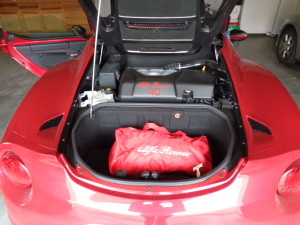 Directly behind the Alfa’s rear engine is a small trunk.