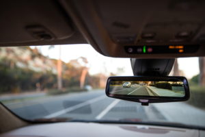 With push of button, rearview mirror becomes live video of what’s behind. (Cadillac)